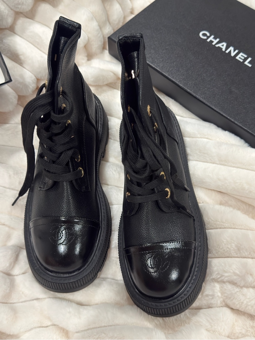 CHANEL Black Leather Lace-Up Combat Boots with Glossy Cap Toe